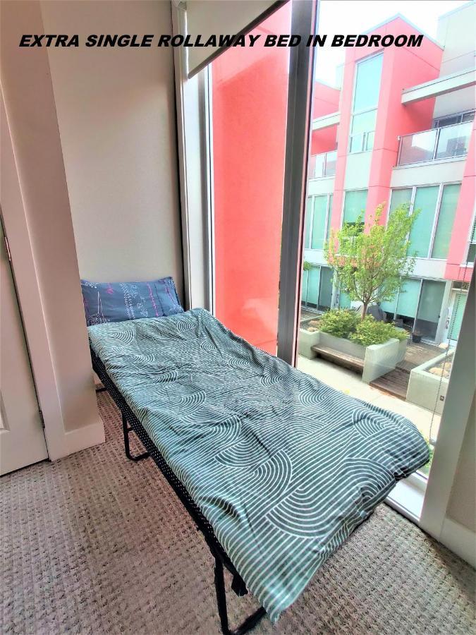 Monki Di Executive Suites - Glas - Luxury Inner City Home 3 Min To Downtown W Private Rooftop Patio Fireplace คาลการี ภายนอก รูปภาพ
